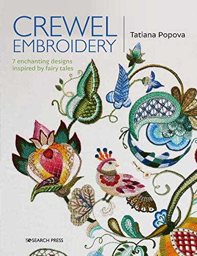 Book cover featuring colorful crewel embroidery of flowers and a bird on white fabric.