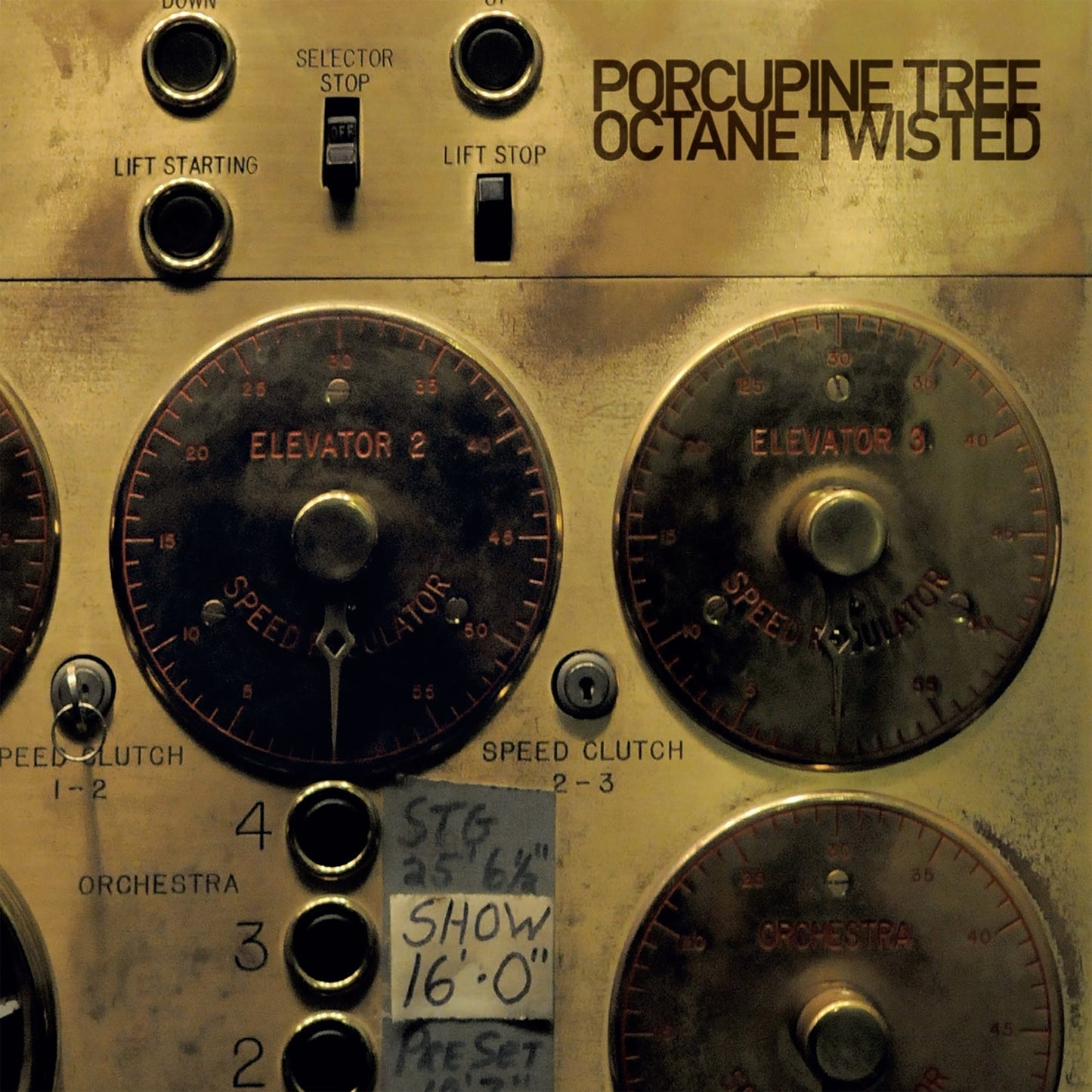 Album cover showing a vintage industrial control panel with dials, switches, and handwritten labels.