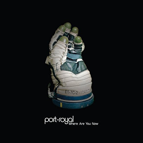 "Vinyl record cover featuring a space suit glove against a black background."