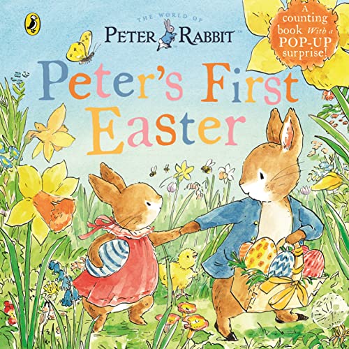 Peter Rabbit and a chick holding Easter eggs amongst daffodils.