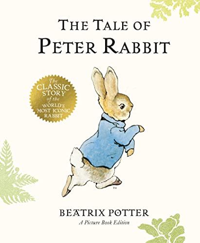 Book cover featuring Peter Rabbit in a blue jacket on a white background.