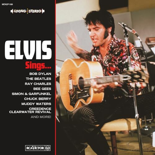 Elvis Presley album cover featuring him playing an acoustic guitar.