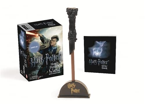 Harry Potter wand with sticker book set, displayed on a stand.