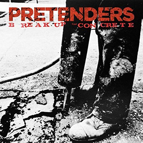 Pretenders album cover: legs breaking concrete, black and white photo.
