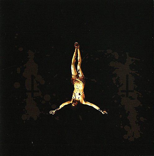 Dark album cover featuring a suspended, distressed figure and inverted crosses.