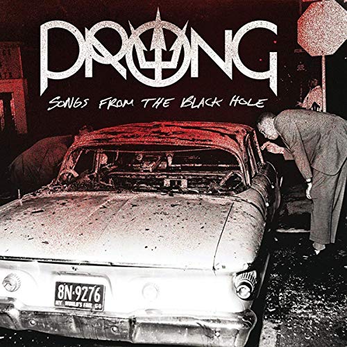 CD cover: damaged car, suited figure, stark black and white image.