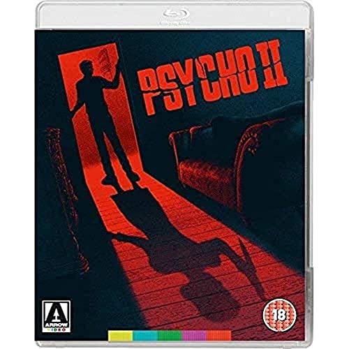 Blu-ray cover for “Psycho II” featuring a silhouetted figure and red lighting.