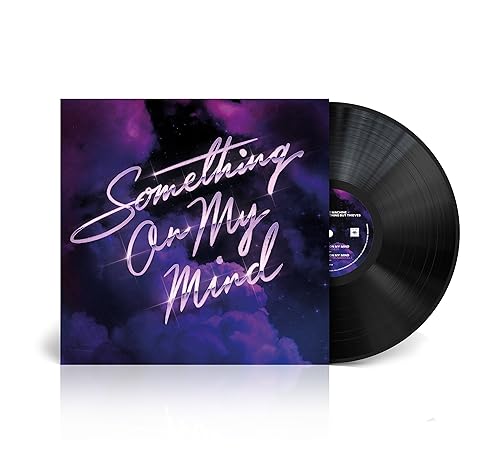 Vinyl record with purple and blue cover art, titled "Something On My Mind".
