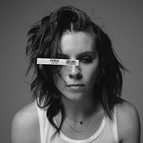 Black and white portrait of a woman with text obscuring her eyes.