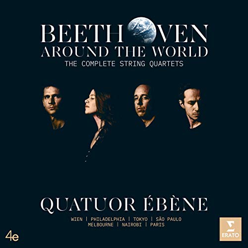 Dark blue album cover with four musicians and a globe, featuring white text.