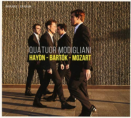 CD cover featuring four men in suits walking, with text “Quatuor Modigliani”.