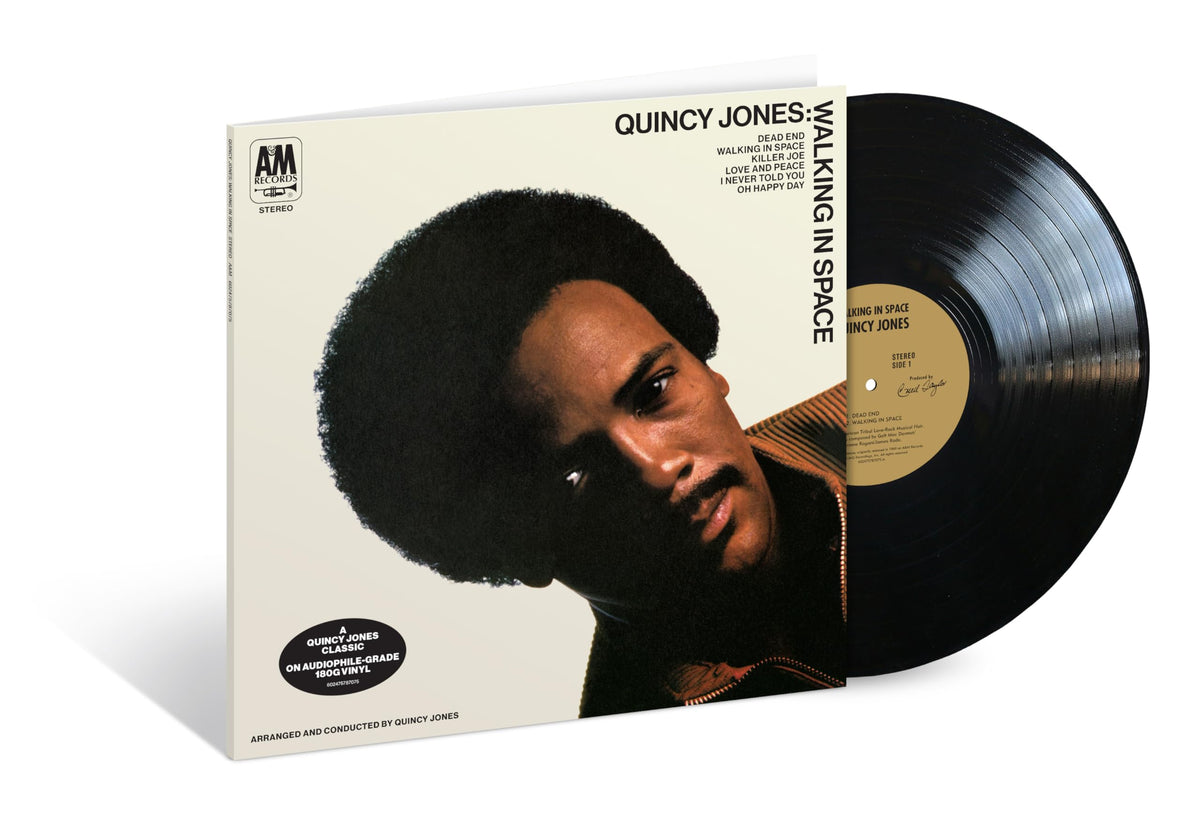 Quincy Jones Walking In Space vinyl record cover featuring a portrait of the artist.