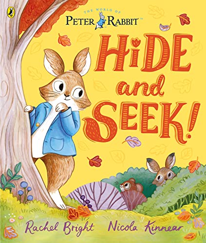 Peter Rabbit book cover with Peter peeking from behind a tree.