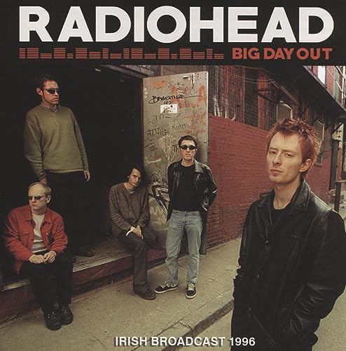 Radiohead album cover: band posing in front of a graffitied doorway.