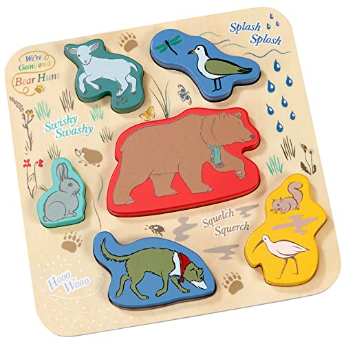 Wooden puzzle with bear, rabbit, bird, and other animal shapes.