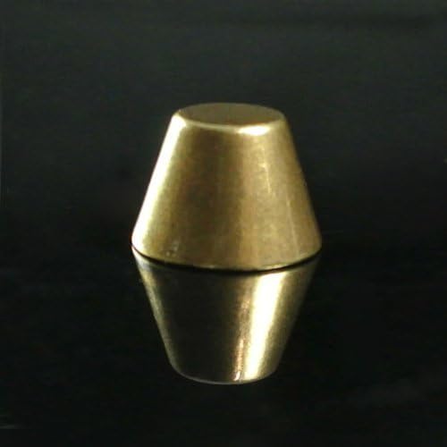 Golden, conical object with a reflective surface on a dark background.