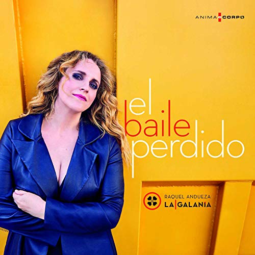 Woman in dark blue jacket stands against yellow wall with album title and artist name.