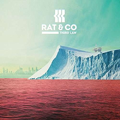 "Vinyl album cover featuring a large iceberg with a city skyline in the background."