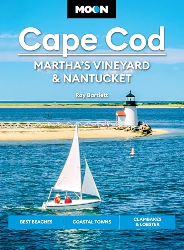 Travel guidebook cover showing a sailboat on the water with a lighthouse in background.