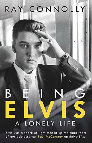 Book cover featuring a young Elvis Presley in a dark suit, looking pensive.