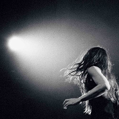 Black and white album cover featuring a woman with flowing hair.