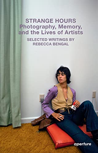 Book cover: woman in purple and denim sits against a wall.