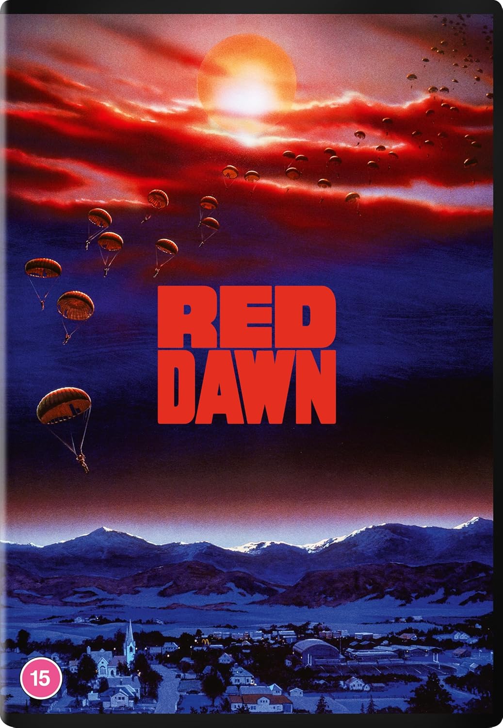 Red Dawn" DVD cover with parachuters descending over a town and mountains.