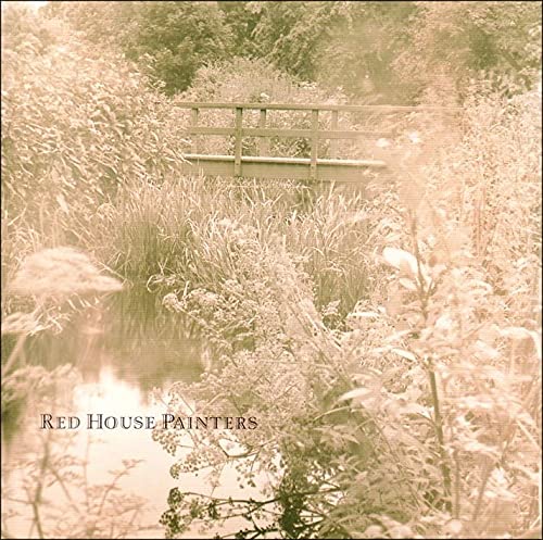 CD cover: a faded, sepia-toned photo of a small wooden bridge.