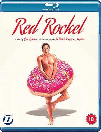 A shirtless man stands inside a large pink frosted donut on this Blu-ray cover.