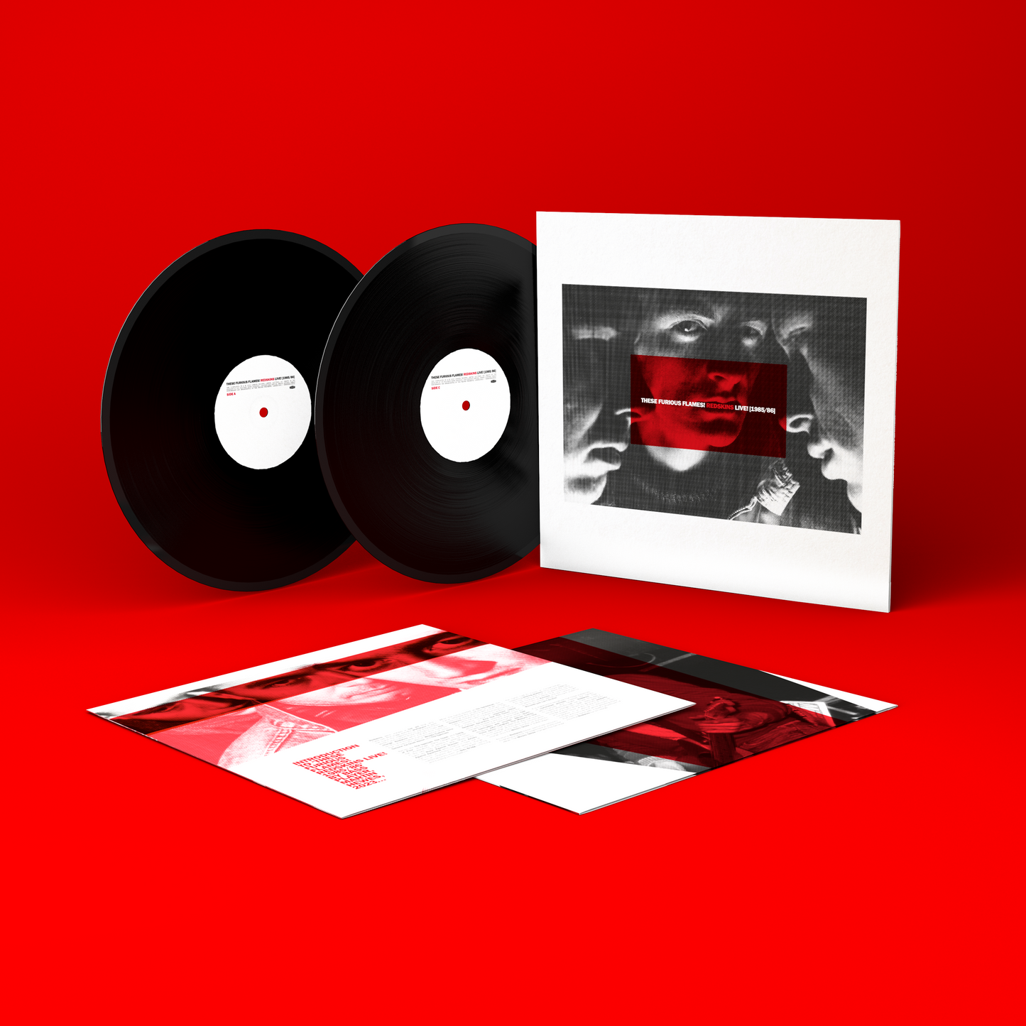 Two vinyl records and gatefold sleeve with red and black imagery.