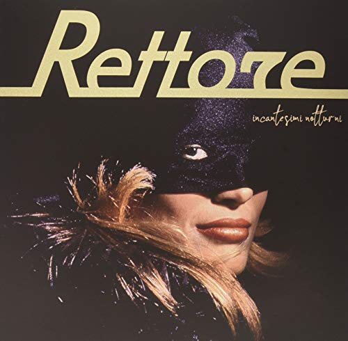Vinyl record cover featuring a masked woman with feathered adornments.
