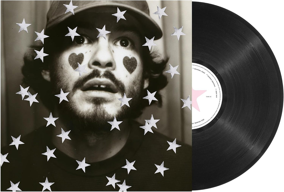 Rex Orange County vinyl record featuring a portrait with star motifs.