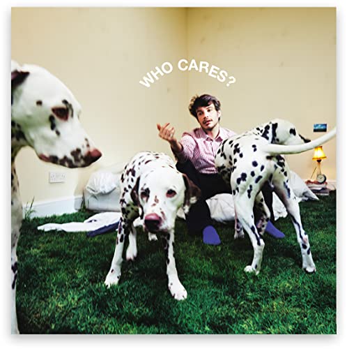 Album cover with a man and three dalmatians on green grass.