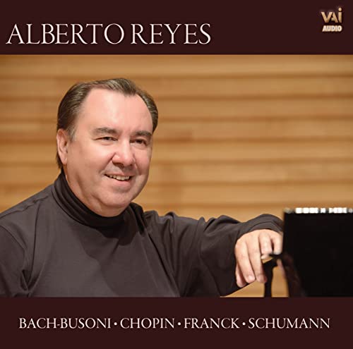 Alberto Reyes portrait, pianist at a grand piano, CD cover.