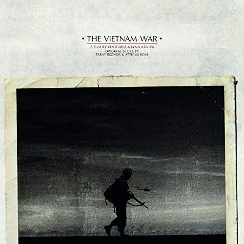 Vinyl cover showing a silhouetted soldier walking against a dark sky with a helicopter.