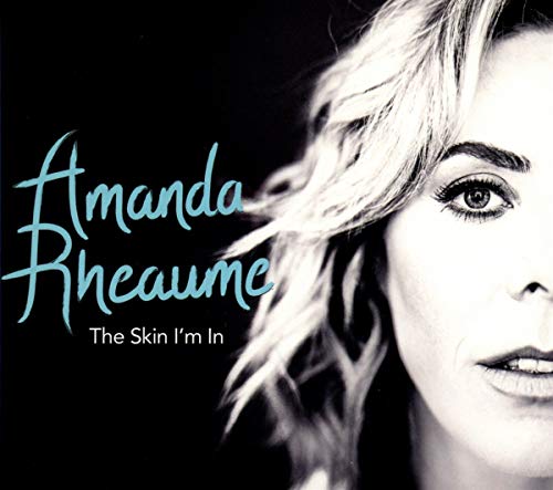 CD cover featuring a close-up portrait of a blonde woman, Amanda Rheaume.