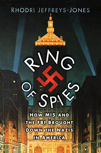 Book cover: “Ring of Spies” with a swastika over a city skyline.