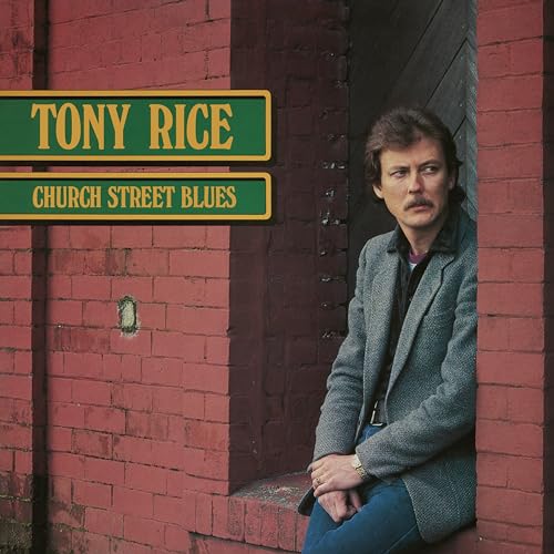 Tony Rice album cover featuring a man leaning against a brick wall.