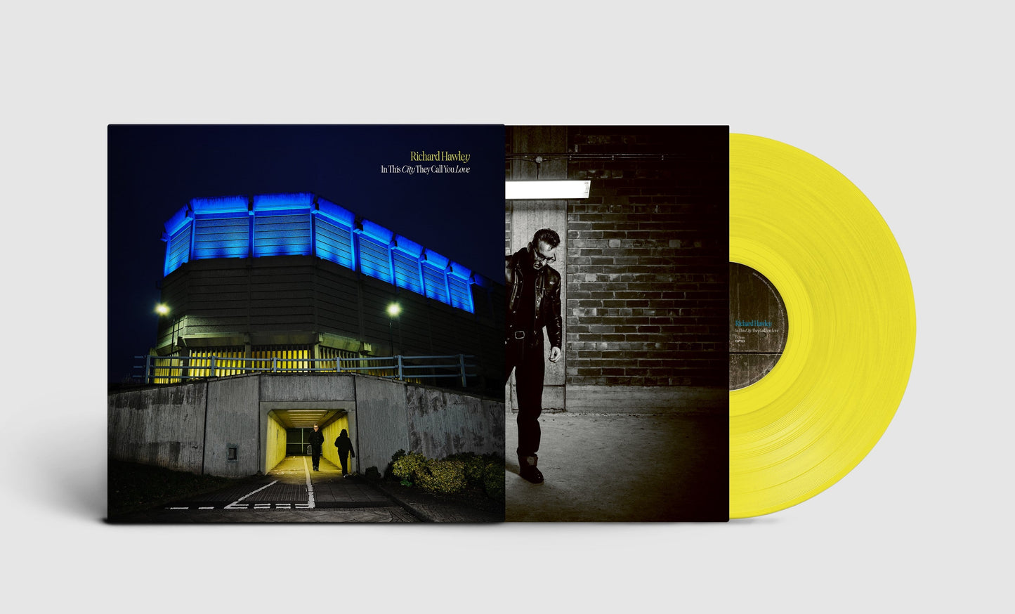 Richard Hawley vinyl record with yellow disc and stadium cover art.