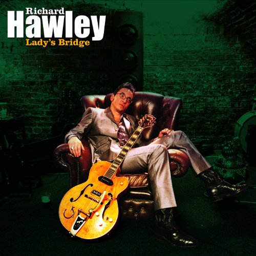 Richard Hawley album cover: musician with guitar in a chair.