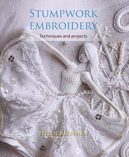 Book cover featuring a detailed, raised white embroidery of a figure.
