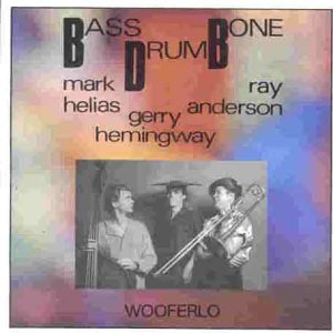 CD cover for “Bass Drum Bone” featuring three musicians with instruments.
