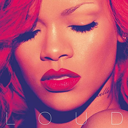 Close-up portrait of Rihanna with bright red hair and red lipstick, titled LOUD.
