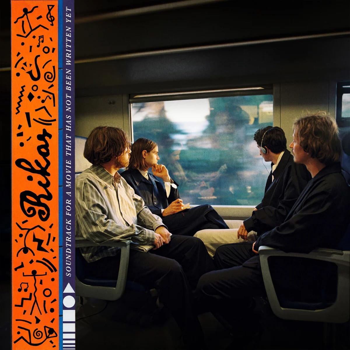 Vinyl record cover featuring four people on a train, ornate text.