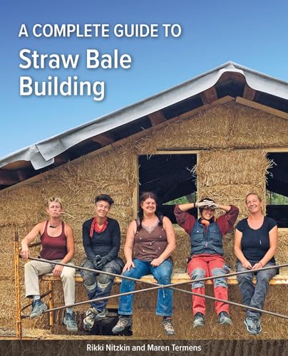 Book cover: “A Complete Guide to Straw Bale Building” with builders.