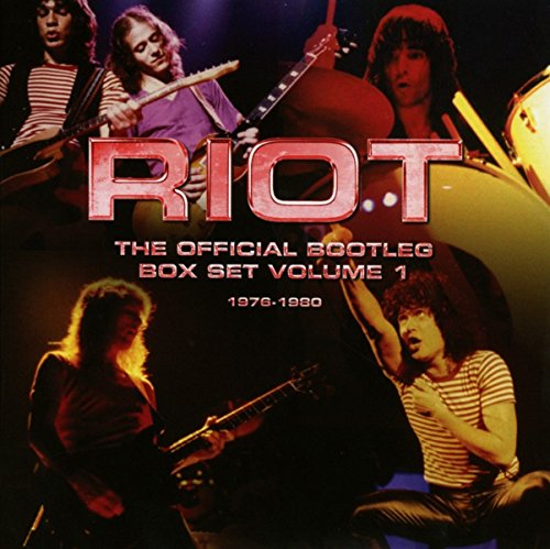 "Riot band members performing on stage, with 'Riot' title in large red letters."