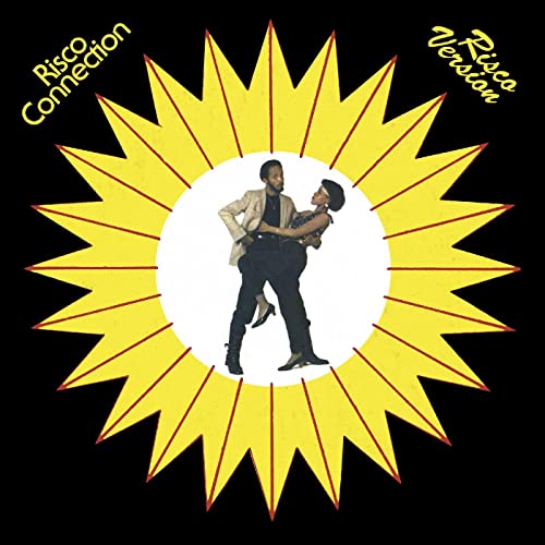 Couple dancing embraced within a yellow starburst on black background.