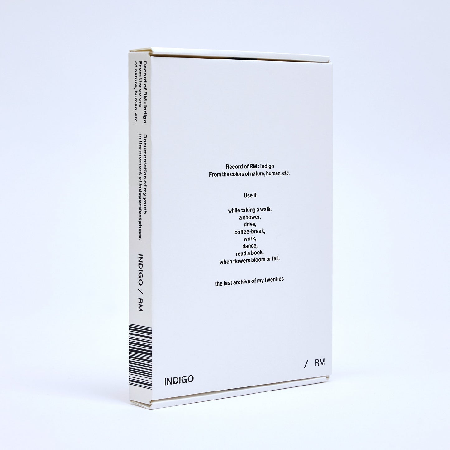 White book edition of RM’s “Indigo” with barcode and text details.