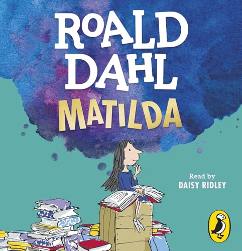 Book cover of "Matilda" featuring a girl reading on stacked boxes.