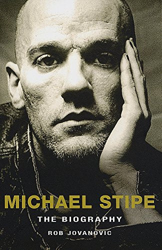 Book cover featuring a close-up portrait of Michael Stipe, titled "The Biography.